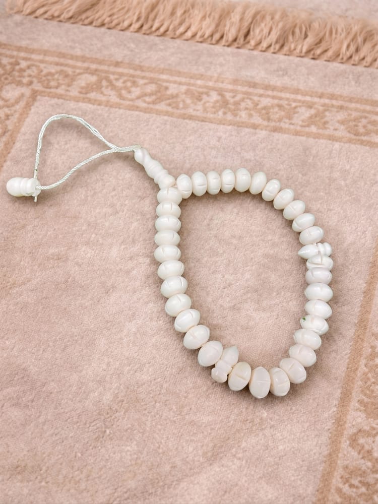 Premium Camel Bone Tasbeeh — Premium Fabric